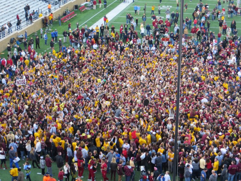 bcfanstakethefieldafterseniorday.jpg